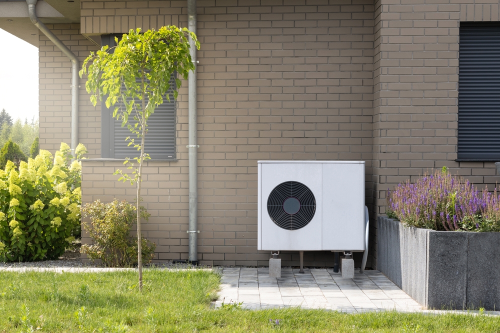 Heat,pump,system,installed,on,modern,building,exterior